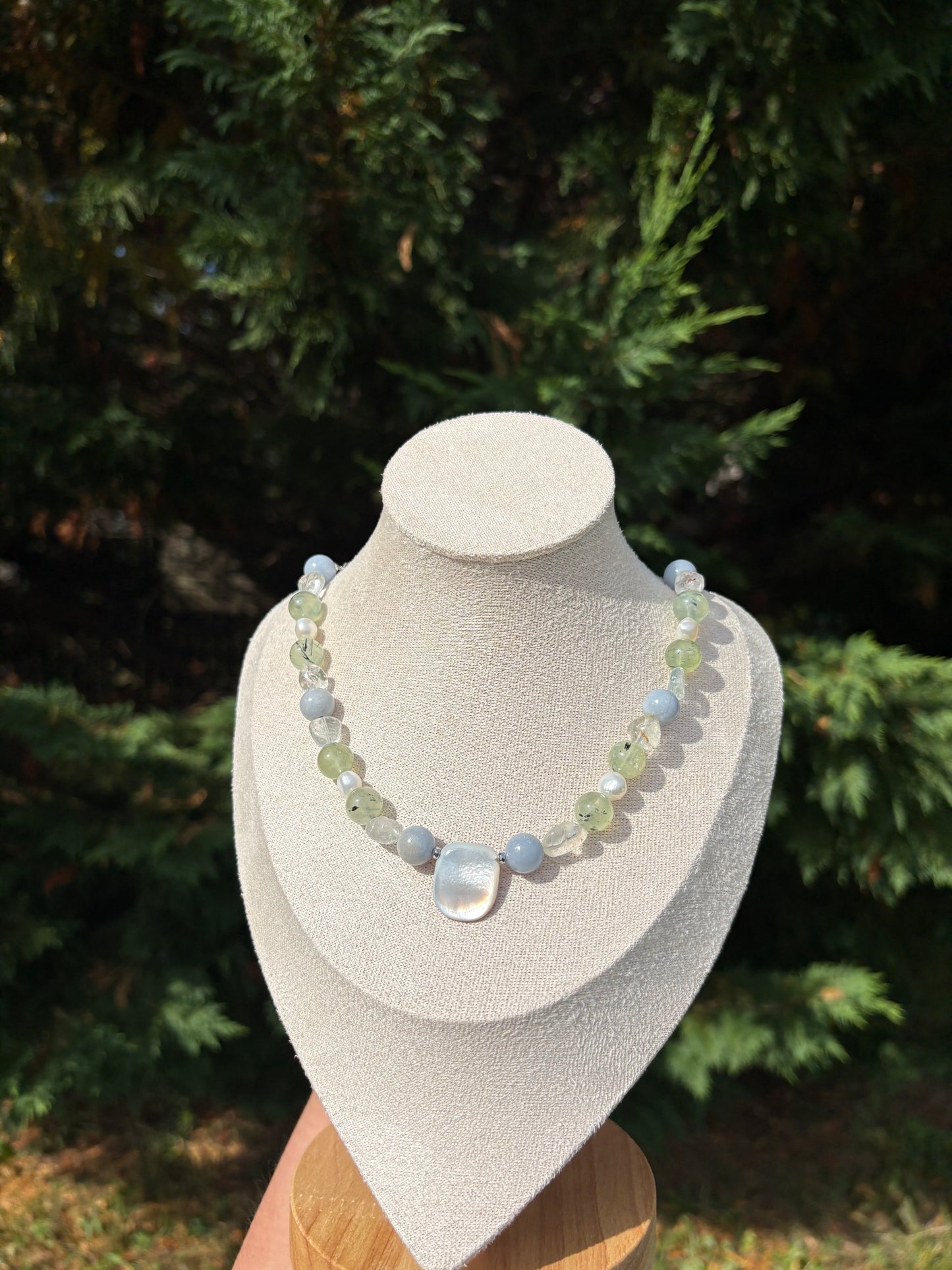 Prehnite, Angelite, Topaz, Freshwater Pearl, and Black Lip Shell necklace