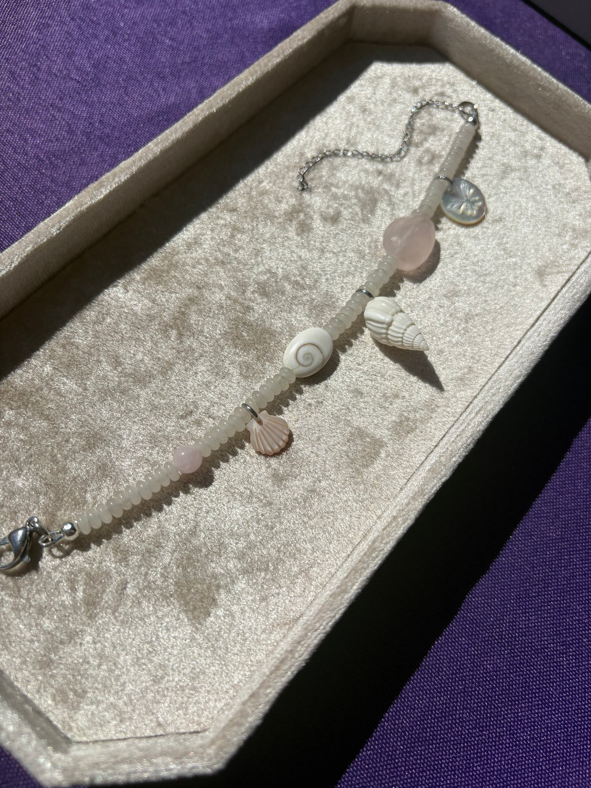 White Jade, Rose Quartz, Morganite, Shiva Shell, Mother of Pearl, Pink Lip Shell, and White Nassa Shell bracelet