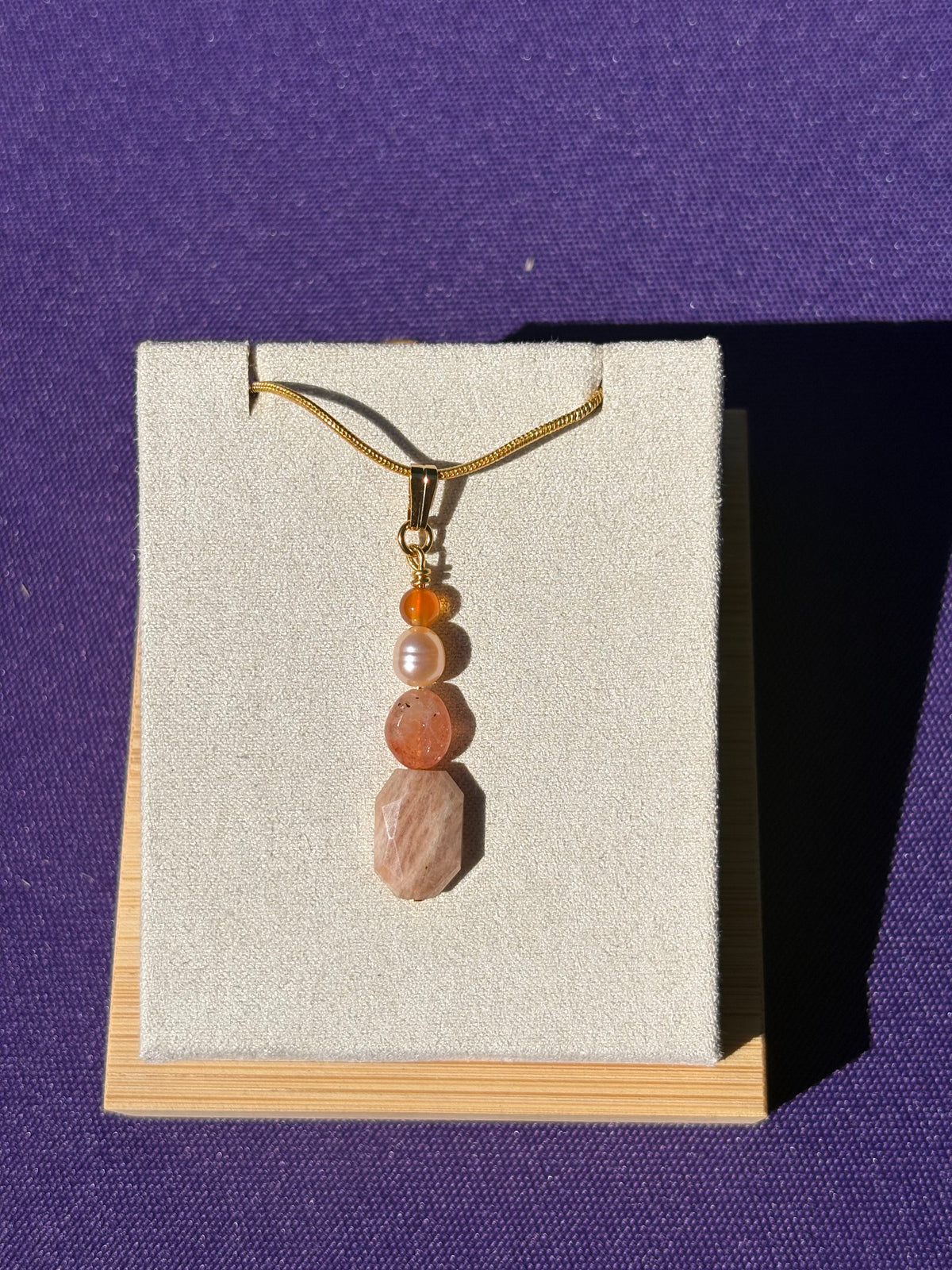 Carnelian, Pink Freshwater Pearl, Sunstone, and Peach Moonstone Pendant